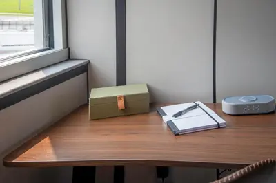 a table with a box and a book on it at 4505 Lofts in Vestal