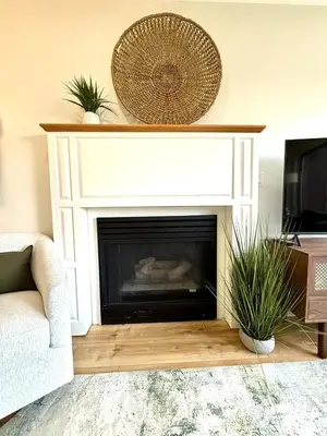 a living room with a fireplace and a tv at The Canopy 4BR Forest Escape Spa, Sip, and Unwind in Vernon Township
