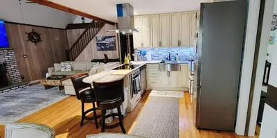 a kitchen with a sink and a counter top at Getaway at the Hideout in Lake Ariel