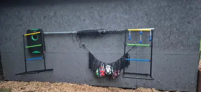 a wall with a group of golf clubs at Charming 3-BR Riverside country farmhouse Retreat Huge Yard & Fire Pit