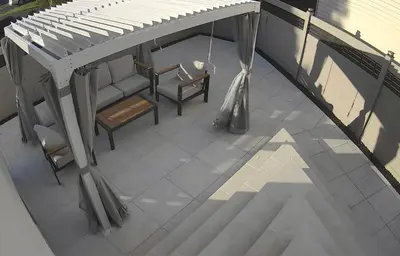 an overhead view of a porch with a piano and chairs at Aum Quite Heaven Stay in Monroe Township