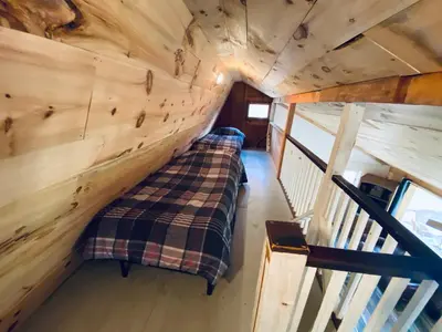 an overhead view of a bedroom in a tree house at UndertheWillows by Towanda Sayre in Ulster