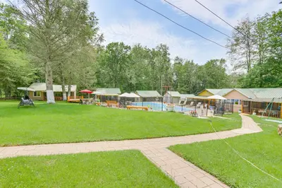 a park with a group of buildings and a pool at 5 Mi to Marina and Raceways Mongaup Valley Retreat! in Mongaup Valley