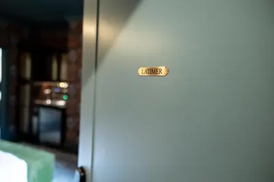a door with a sign that says danger on it at The Gas Lamp Hotel in Philadelphia