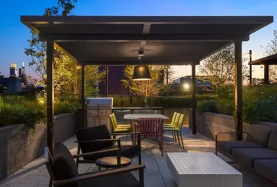 a gazebo with chairs and a table on a patio at Luxury Apartments by Hyatus at Central Philly in Philadelphia