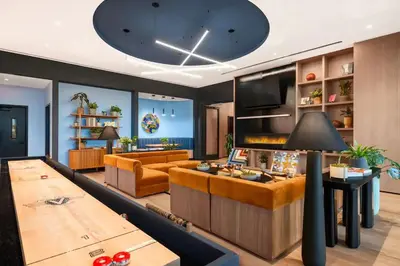 a living room with a couch and a table at Luxury Apartments by Hyatus at Central Philly in Philadelphia