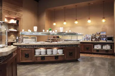a large kitchen with a large counter in a restaurant at DoubleTree by Hilton Hotel Reading in Reading