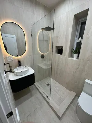 a bathroom with a shower and a sink and a toilet at The View - Direct Bus Time Square NYC Breakfast Included - D in Jersey City