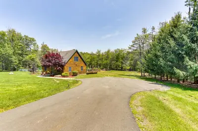 an empty road in front of a house at Home Theater and Game Room Home in Glen Wild! in Glen Wild