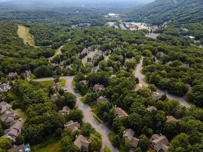 an aerial view of a subdivision of houses at HOT TUB 4 Min Dr to Camelbeach in Tannersville