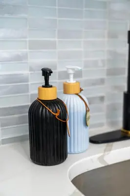 two black and white fire hydrants sitting on a bathroom counter at Modern Studio - Parking Available - 15 min NYC in Jersey City