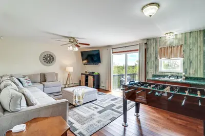 a living room with a game table in it at Game Room! Lake-View Gem 7 Mi to Camelback Slopes in Long Pond