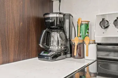 a kitchen counter with a blender on a counter top at New townhouse SLEEP 4 Best Spot-Old City Philly in Philadelphia