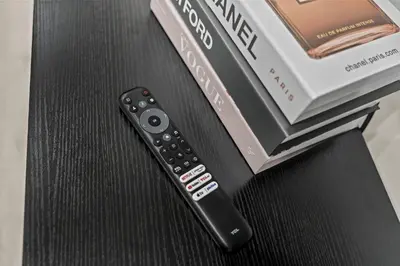 a remote control sitting on top of a box at New Townhouse Sleep 4 Old City Walk to Everything! in Philadelphia