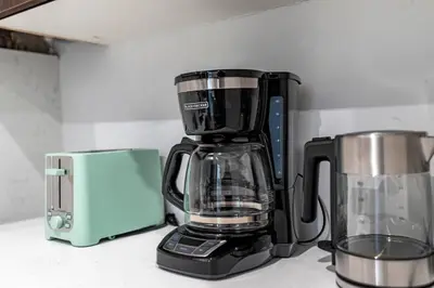 a blender sitting on a counter next to a toaster at Walk to Everything in Old City- ADA compliant unit in Philadelphia