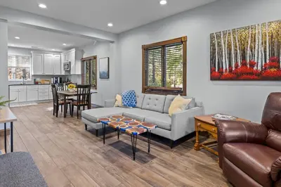 a living room with a couch and a table at Long Term Favorite - Skippack Village in Schwenksville