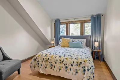 a bedroom with a bed and a window at Long Term Favorite - Skippack Village in Schwenksville