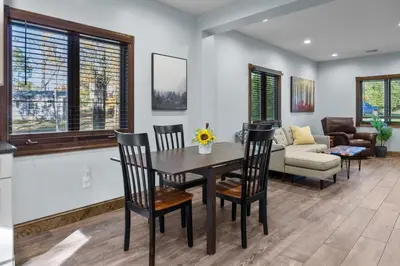 a dining room with a table and chairs and a couch at Long Term Favorite - Skippack Village in Schwenksville