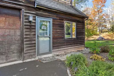 a small house with a door on the side of it at Long Term Favorite - Skippack Village in Schwenksville