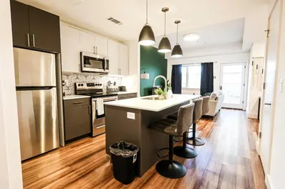 a kitchen with a island in the middle of a kitchen at 1bdrmapartment In The-heartofphiladelphia in Philadelphia