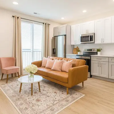 a living room with a couch and a table at 1Bed1Bath-CentralKingBed,WD,WIFI in Philadelphia