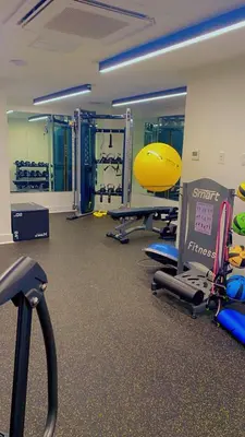 a gym with a lot of equipment in a room at Modern 1BD AptWiFi,Gym,Washer in Philadelphia