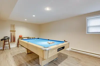 a room with a pool table in it at Lake Access at Family-Friendly Home in Tobyhanna in Tobyhanna