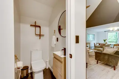 a bathroom with a toilet and a sink at Lake Access at Family-Friendly Home in Tobyhanna in Tobyhanna
