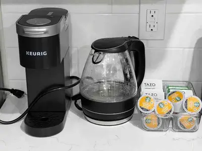 a blender sitting on top of a counter with eggs at Haven 2 Bedroom by EWR airport in Newark