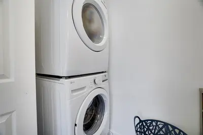 a washing machine and a dryer in a room at Remodeled 4BR w Yard, Fire Pit, Near Camelback in Tannersville