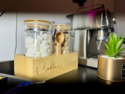 a jar of white pills and a wooden spoon on a counter at BP STAYS - Hotel-Style, No Host, Professionally Managed ID265 in Jersey City