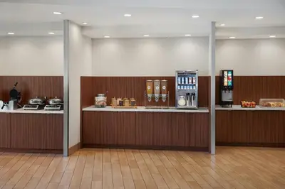 a lobby with a coffee shop with a vending machine at Fairfield Inn & Suites by Marriott Reading Wyomissing in Wyomissing