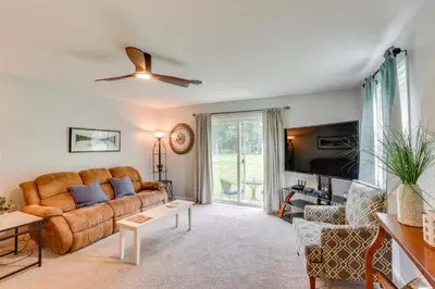 a living room with a couch and a tv at Family Retreat Near Hersheypark with Horse Farm View in Elizabethtown