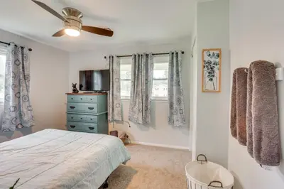 a bedroom with a bed and a ceiling fan at Family Retreat Near Hersheypark with Horse Farm View in Elizabethtown
