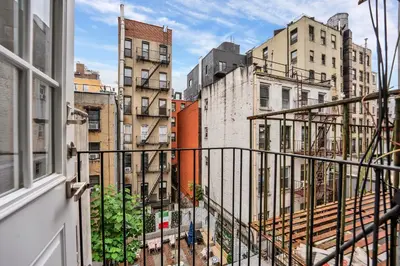 a view of a city from a balcony at SoHo Designer 2BR with balcony in New York