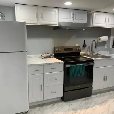 A Cozy Corner with kitchen and parking