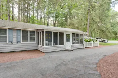 a house with a driveway in front of it at Fish and Hike Lakeside Poconos Retreat, Unit 3 in Bangor