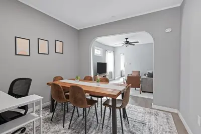 a dining room with a table and chairs at Cozy Home, 19 min to NYC, 3 Car Driveway in Wallington