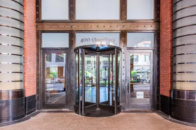 an entrance to a building with two revolving doors at Blueground Battery Park City rooftop nr Hudson River NYC-586 in New York