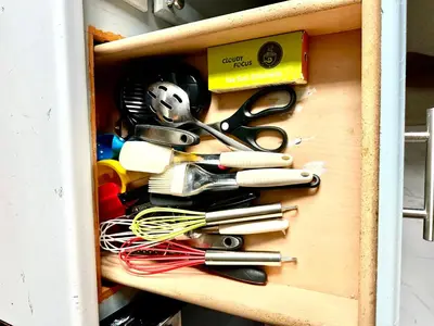 a drawer filled with scissors and other office supplies at Cozy Drexel Hill Retreat - Perfect for Families in Drexel Hill
