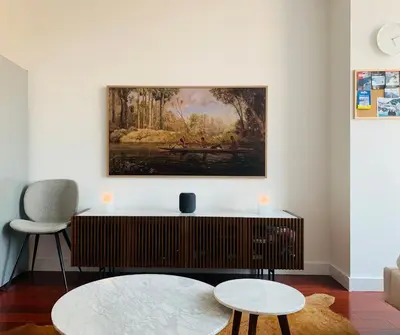 a living room with a painting on the wall at Entire luxury apt midtown with pool, gym, and sauna in New York