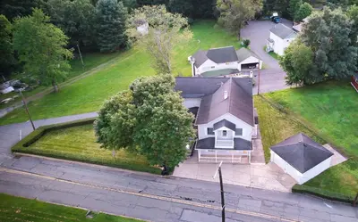 an overhead view of a house with a driveway at Charming 2-Bedroom, 1-Bath Getaway in Carbondale
