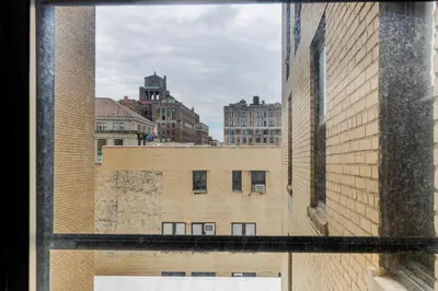 a view of a city from a window at Blueground Upper West Side fitness nr Central Park NYC-1932 in New York