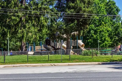 a playground with a slide in a park at Comfy 1 BR Hide Away Apt w Garage Parking in Bryn Mawr