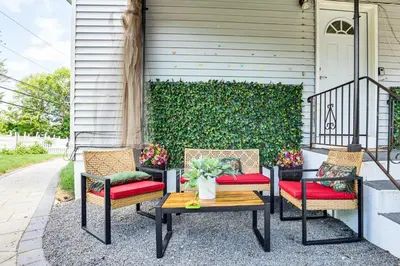 a patio with two chairs and a table at 2 Mi to The Marketplace Spring Valley Apartment in Spring Valley