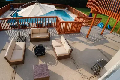 an overhead view of a patio with chairs and a pool at 4BR Winter Escape Ski & Wineries in Sussex