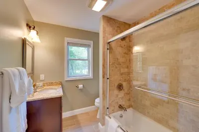 a bathroom with a tub and a sink and a shower at Creek Dips and Smores Catskills Gem
