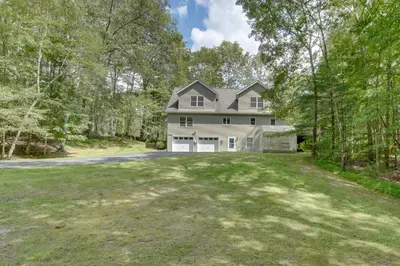 a large white house with a driveway at Creek Dips and Smores Catskills Gem