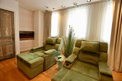 a living room with two chairs and a couch at Urban Luxe Redefined in Central city Phila in Philadelphia