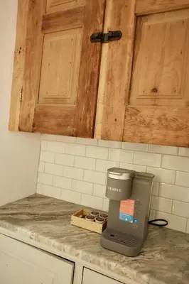 a coffee maker on a counter in a kitchen at Urban Luxe Redefined in Central city Phila in Philadelphia